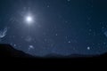 A christmas star shines at night over the mountains of Bethlehem Royalty Free Stock Photo