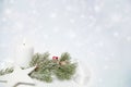 Christmas star and white candle Royalty Free Stock Photo