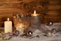 Christmas decoration with candles in the snow Royalty Free Stock Photo