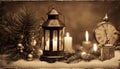 christmas still life with candle black and white A vintage Christmas with a lantern and a fir tree branch. Royalty Free Stock Photo