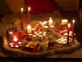 Christmas still life with candles of different size and shape, d Royalty Free Stock Photo