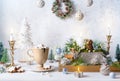 Christmas still life with cup of hot chocolate, gingerbread cookies, candles, Christmas ornaments. Winter cozy home concept