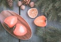 Christmas still life with persimmon and cinnamon with fir-tree on wooden background. Top view. Royalty Free Stock Photo