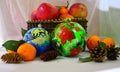 Christmas still life of fruit, balls and cones. Royalty Free Stock Photo