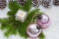 Christmas still life has the burning candle. Royalty Free Stock Photo