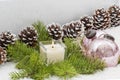 Christmas still life has the burning candle. Royalty Free Stock Photo