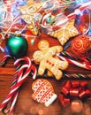 Christmas still life. homemade ginger biscuits, cane candy, on a Royalty Free Stock Photo