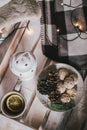 Christmas still life with tea, lights, cones and cookies Royalty Free Stock Photo