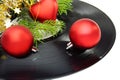 Christmas still life with a vinyl disc and balls. Royalty Free Stock Photo