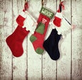 Christmas stocking against rustic wood Royalty Free Stock Photo