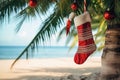 Christmas stocking hanging on coconut palm tree at tropical exotic beach. AI Generated Royalty Free Stock Photo