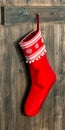 Christmas stocking. Red sock with snowflakes for Santa gifts Royalty Free Stock Photo