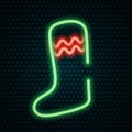 Christmas stocking. Shining neon icon. Colored vector illustration. Isolated background. A boot for hiding a gift. Royalty Free Stock Photo