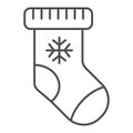 Christmas stocking thin line icon. Sock with snowflake vector illustration isolated on white. Gift outline style design