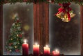 Christmas window,candles,gold bells,tree decorations,snow background for greeting card Royalty Free Stock Photo