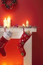 Christmas stockings hanging over fireplace