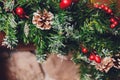 Christmas stockings hanging over a fireplace with candles on the mantlepiece. Royalty Free Stock Photo