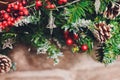 Christmas stockings hanging over a fireplace with candles on the mantlepiece. Royalty Free Stock Photo