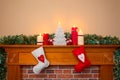 Christmas stockings over a fireplace Royalty Free Stock Photo