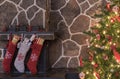 Christmas stockings and tree Royalty Free Stock Photo