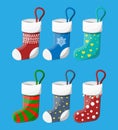 Christmas stockings in various colors. Royalty Free Stock Photo