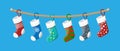 Christmas stockings in various colors on rope Royalty Free Stock Photo