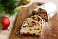 Christmas Stollen Bread made at home with Dried Fruit on a Wooden Board, side view Royalty Free Stock Photo