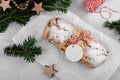 Christmas stollen with gift tag is traditional festive German bread, Holiday pastry dessert