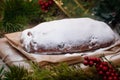 Christmas stollen its a Traditional Dresdner German Christmas cake Stollen with raising, berries and nuts. Powdered sugar is