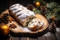 Christmas stollen with raisins and cinnamon on a wooden background