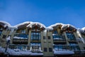 A Christmas Story in Whistler  village - Snow-covered buildings - on the roofs, Ski resort. A cold but clear sunny winter day. Royalty Free Stock Photo