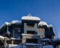 A Christmas Story in Whistler  village - Snow-covered buildings - on the roofs, Ski resort. A cold but clear sunny winter day. Royalty Free Stock Photo