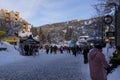 Christmas Story in Whistler village - Snow-covered buildings - on the roofs, Ski resort - people walking to gondola. Royalty Free Stock Photo