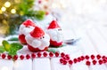 Christmas strawberry Santa. Funny dessert stuffed with whipped cream