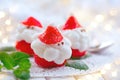 Christmas strawberry Santa. Funny dessert stuffed with whipped cream Royalty Free Stock Photo