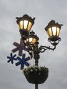 Christmas street decoration on lamp Royalty Free Stock Photo