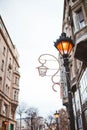 Christmas street decoration. Warm street lamp. Christmas lights In Budapest, Hungary between Christmas and New Year`s Eve. Lanter Royalty Free Stock Photo