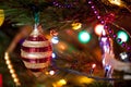 Beautiful original toy whirligig on Christmas tree close-up Royalty Free Stock Photo