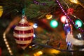 Beautiful original toy whirligig on Christmas tree close-up Royalty Free Stock Photo