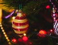 Beautiful original toy whirligig on Christmas tree close-up Royalty Free Stock Photo