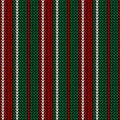 Christmas stripes pattern in red, green, off-white. Vertical knitted lines.