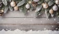 Christmas, subdued background, with fir branches decorated with baubles, pine cones, and falling snowflakes Royalty Free Stock Photo