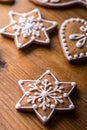 Christmas sweet cakes. Christmas homemade gingerbread cookies on wooden table Royalty Free Stock Photo