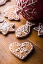 Christmas sweet cakes. Christmas homemade gingerbread cookies on wooden table Royalty Free Stock Photo