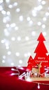 Christmas table on the background of Christmas lights bokeh Royalty Free Stock Photo