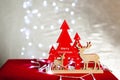 Christmas table on the background of Christmas lights bokeh Royalty Free Stock Photo