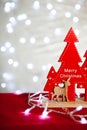 Christmas table on the background of Christmas lights bokeh Royalty Free Stock Photo