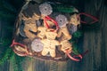 Christmas table basket gingerbreads sweets sprigs spruce Royalty Free Stock Photo