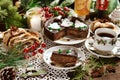 Christmas table with poppy seed cakes and coffee Royalty Free Stock Photo