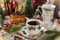 Christmas table with coffee and carrot and apple cake with chocolate glaze Royalty Free Stock Photo